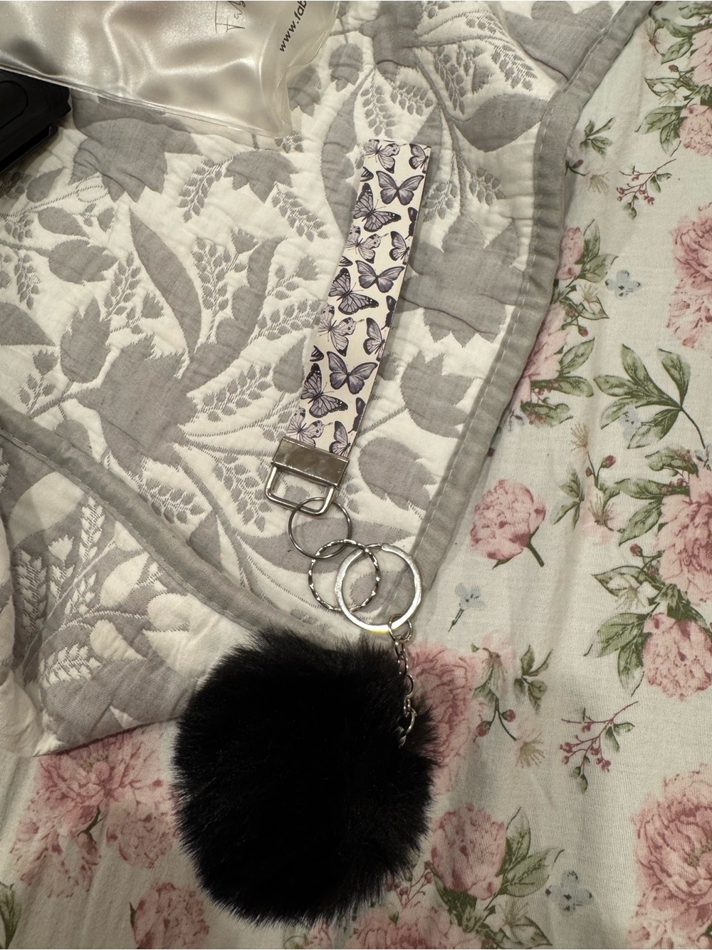 Butterfly Print Wristlet Keychain with Black Pom Pom
